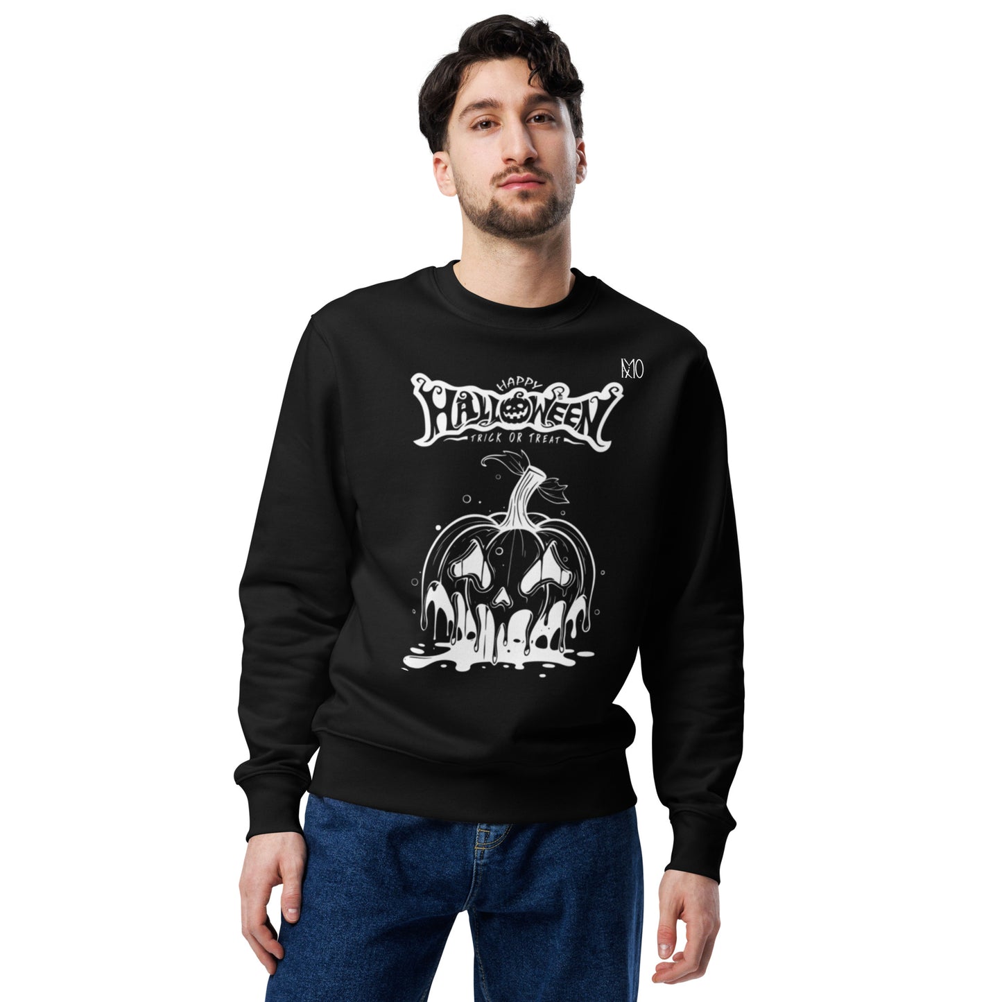 Man wearing a black Halloween-themed sweatshirt with a white pumpkin design on a white background
