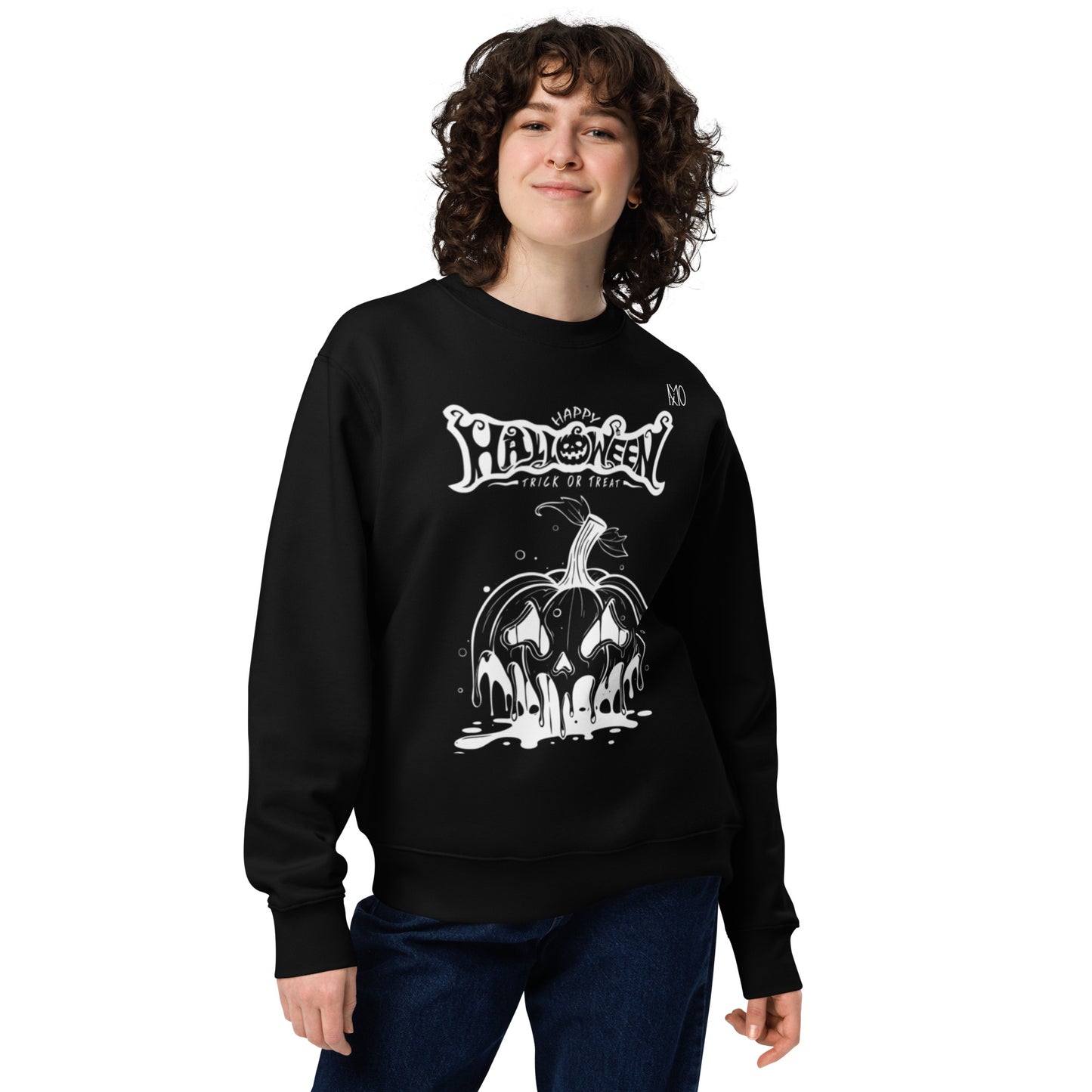 Person wearing a black sweatshirt with a Halloween-themed design on a white background