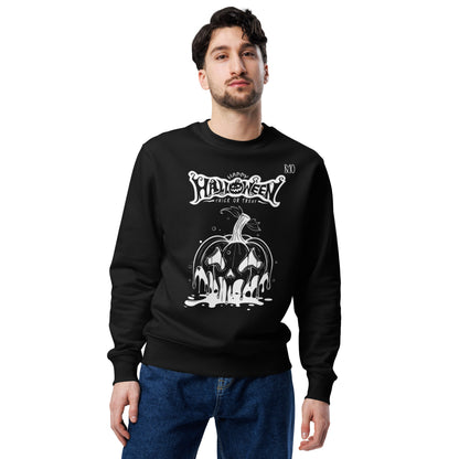 Man wearing a black Halloween-themed sweatshirt with a white pumpkin design on a white background