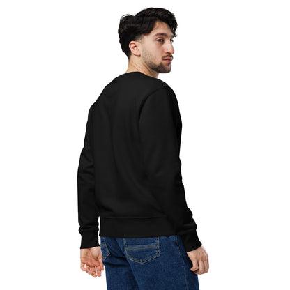 Man wearing a black sweatshirt and blue jeans on a white background
